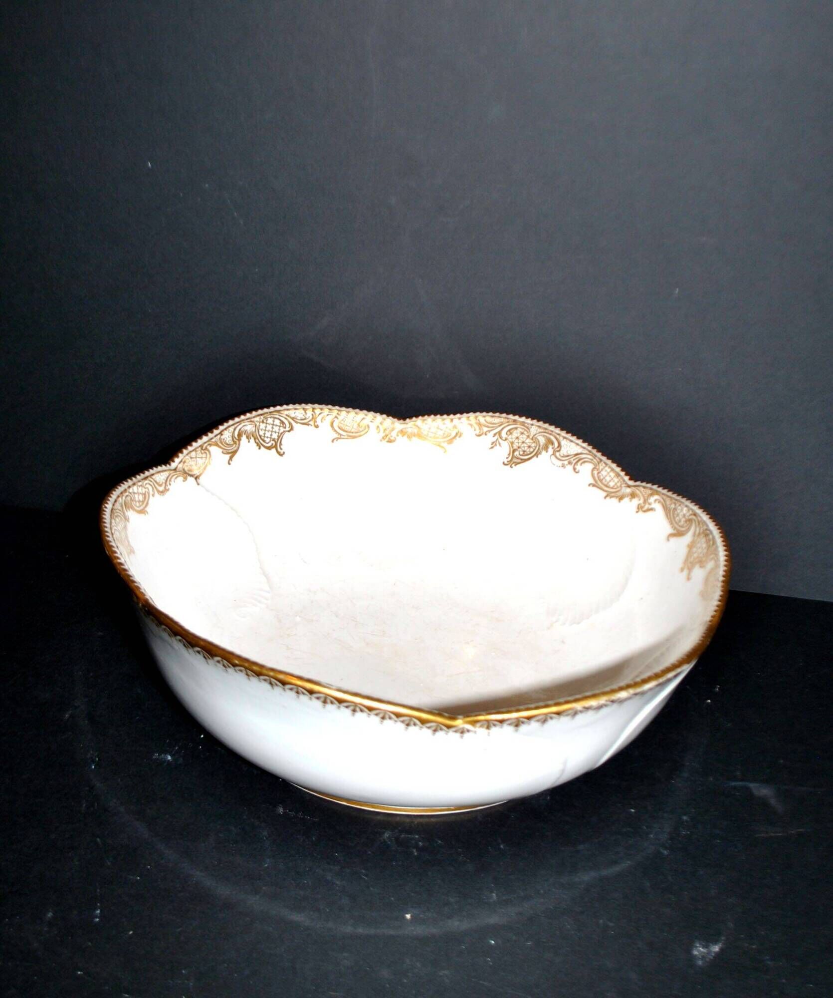 Antique Sèvres porcelain salad bowl with hand-painted gold arabesque decoration