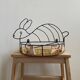 Wrought iron shelf and porcelain rabbit figurines