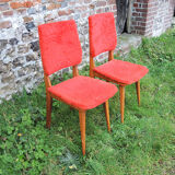 2 old red 'moumoute' chairs