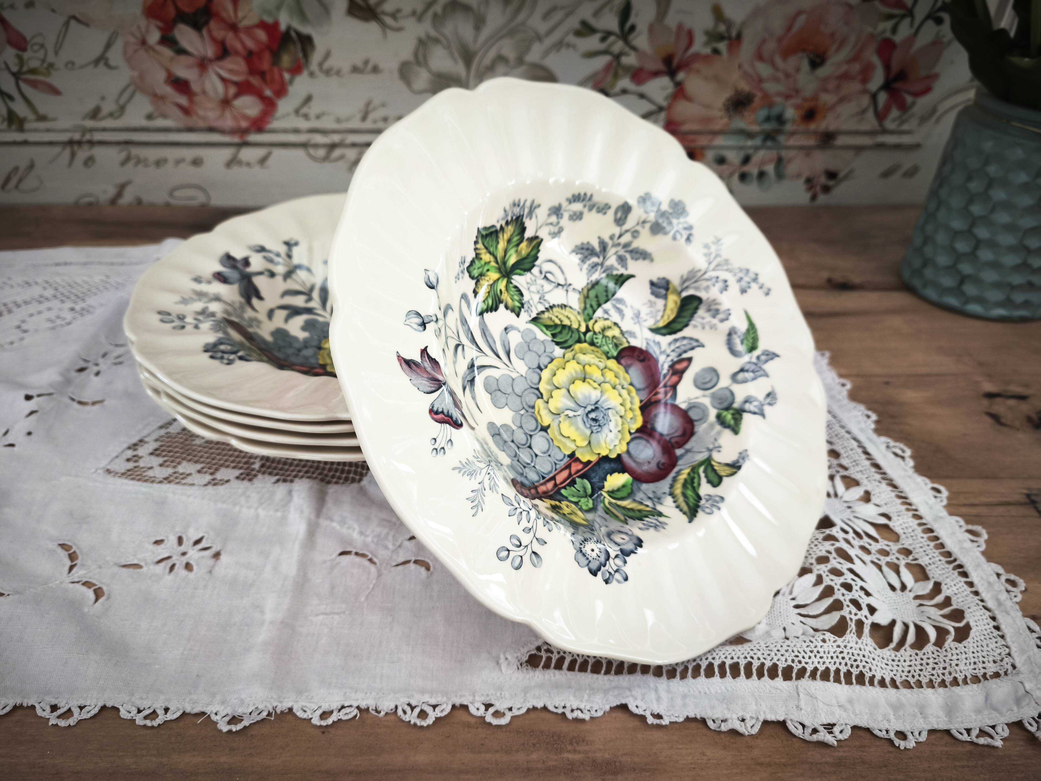 Set of 5 Royal Doulton deep plates in the Kirkwood pattern.