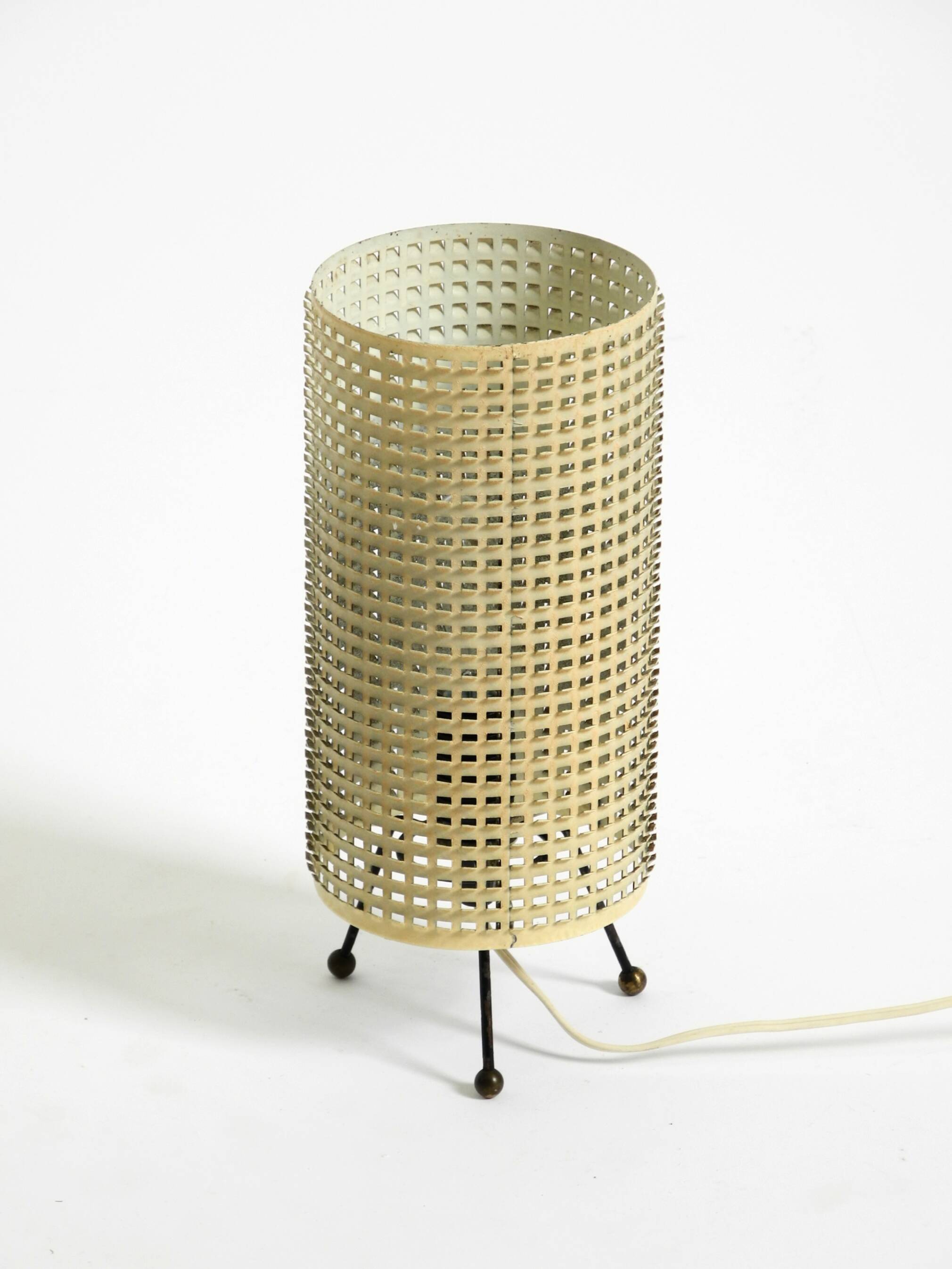 Original 1950s brass tripod table lamp with a perforated metal lampshade