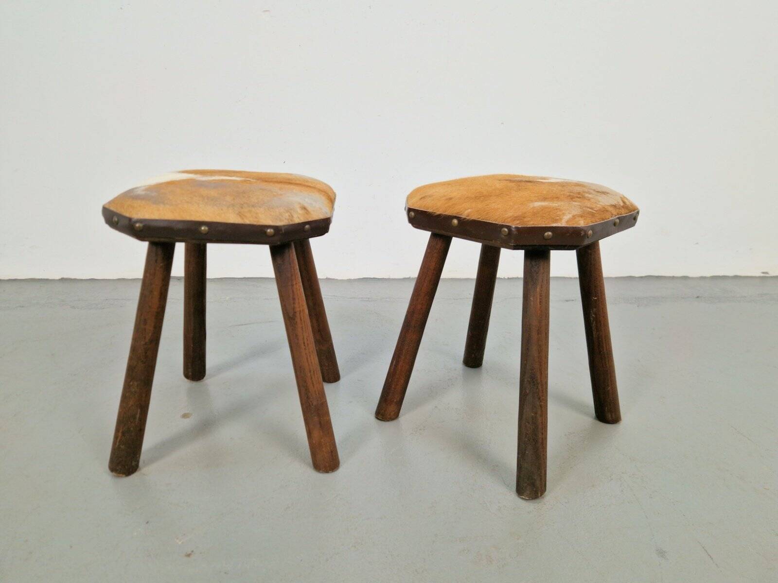 Vintage Milk Stools with Cowhide Seats, 1950s, Set of 2