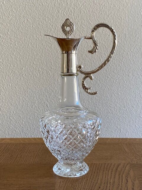 Glass and silver metal ewer