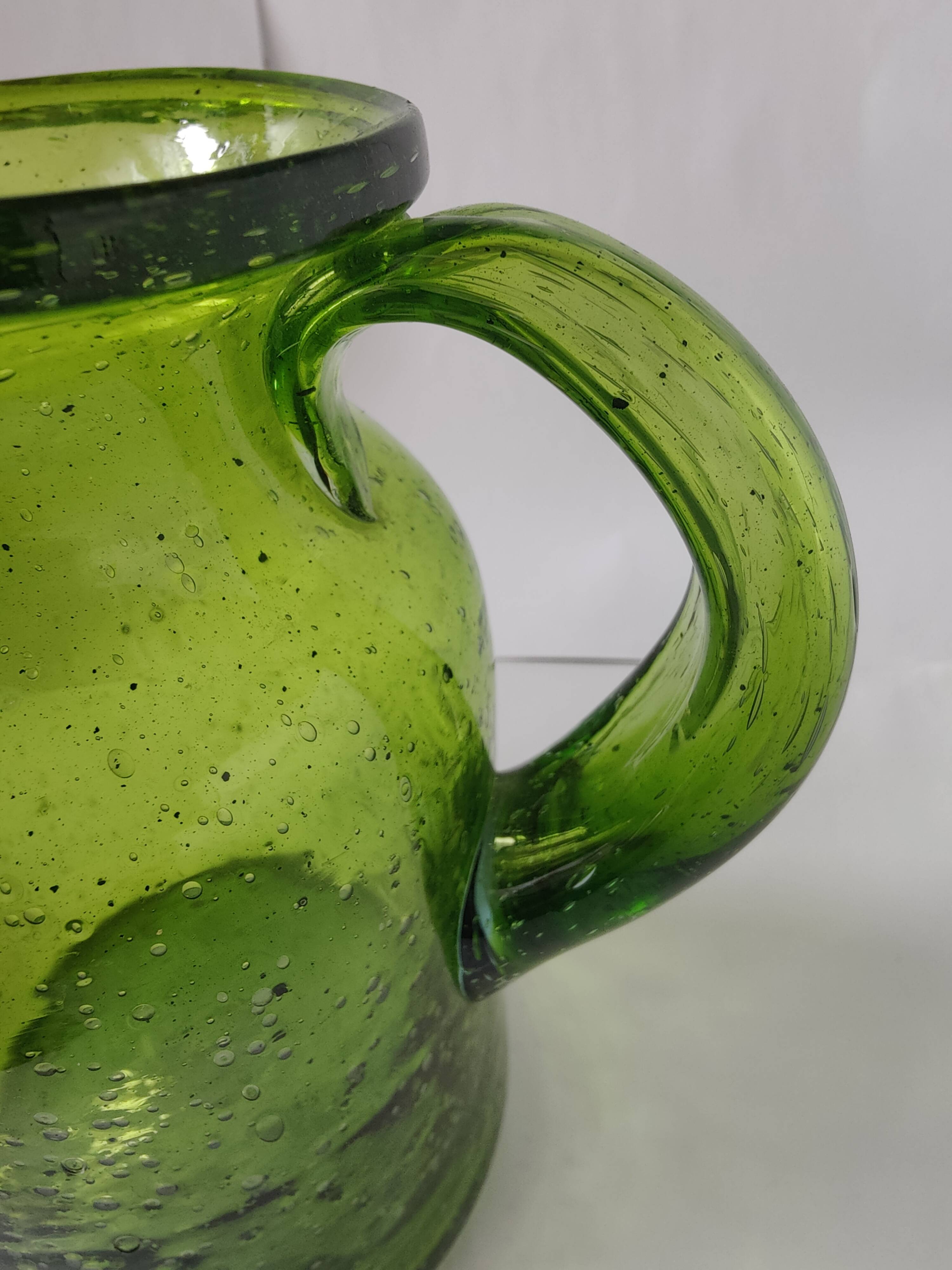 Bubble glass pitcher in the style of Biot or Empoli.