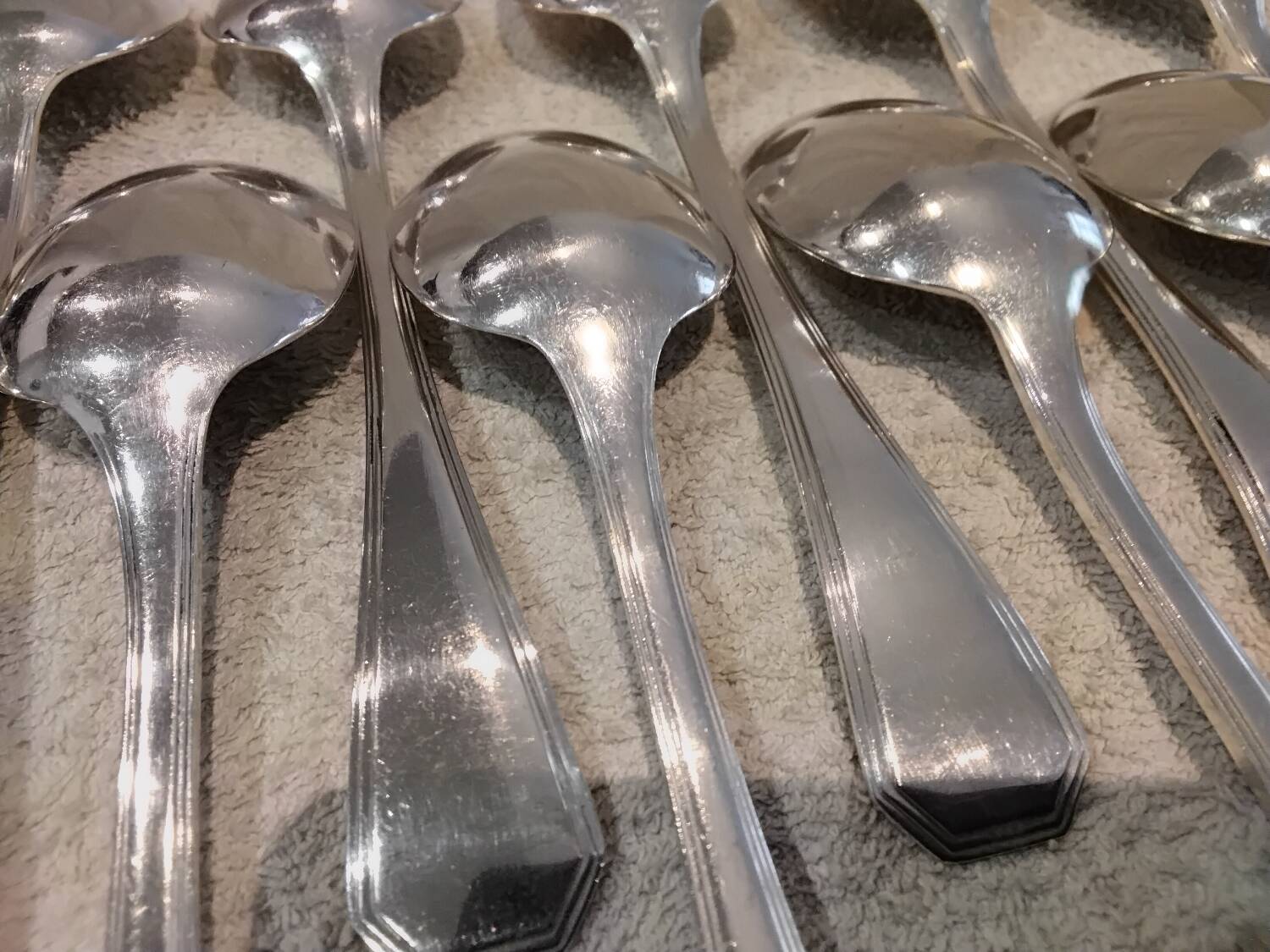 12 silver-plated soup spoons by Christofle America