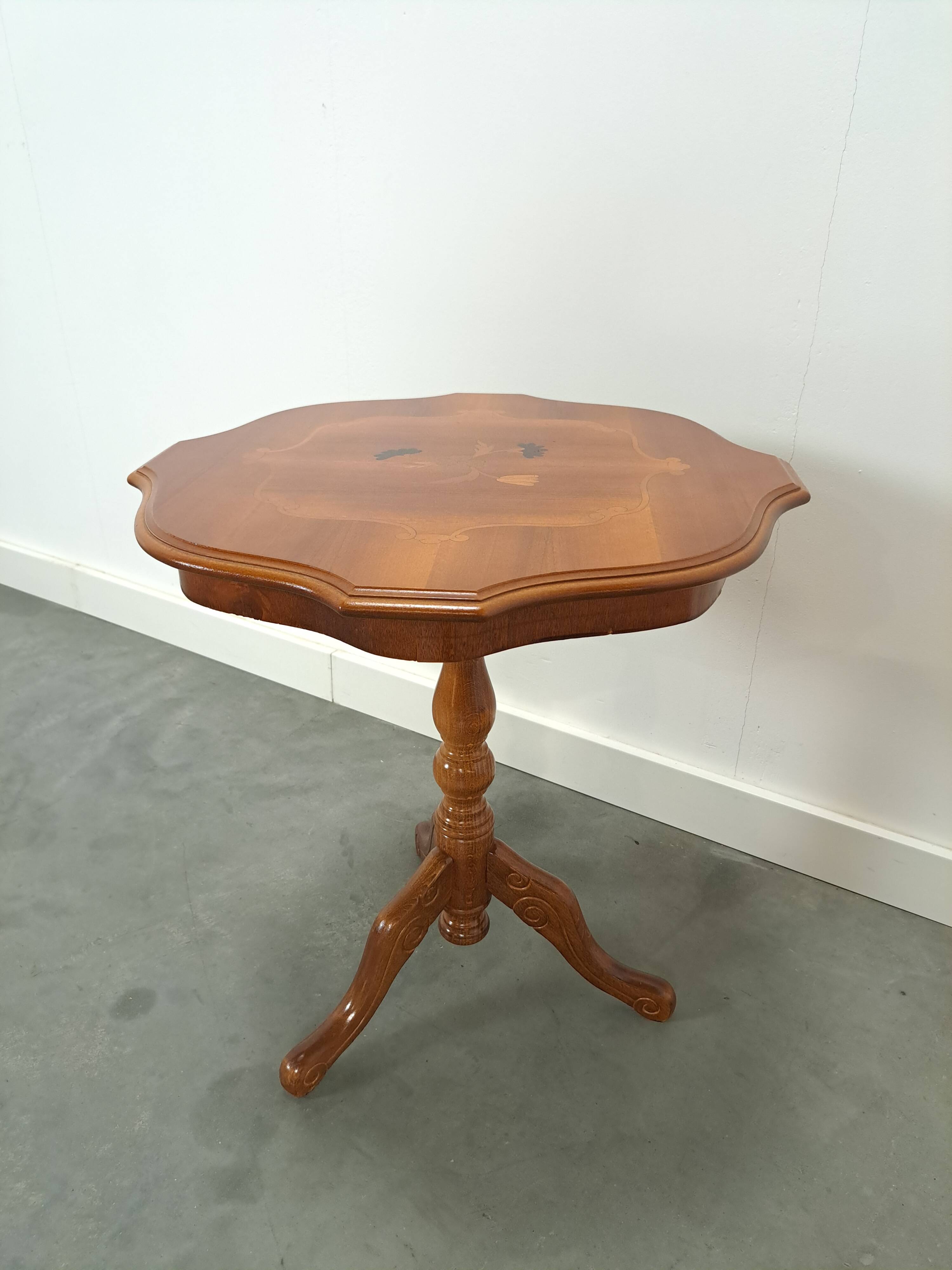 Round vintage wooden side table with inlaid veneer