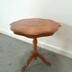 Round vintage wooden side table with inlaid veneer