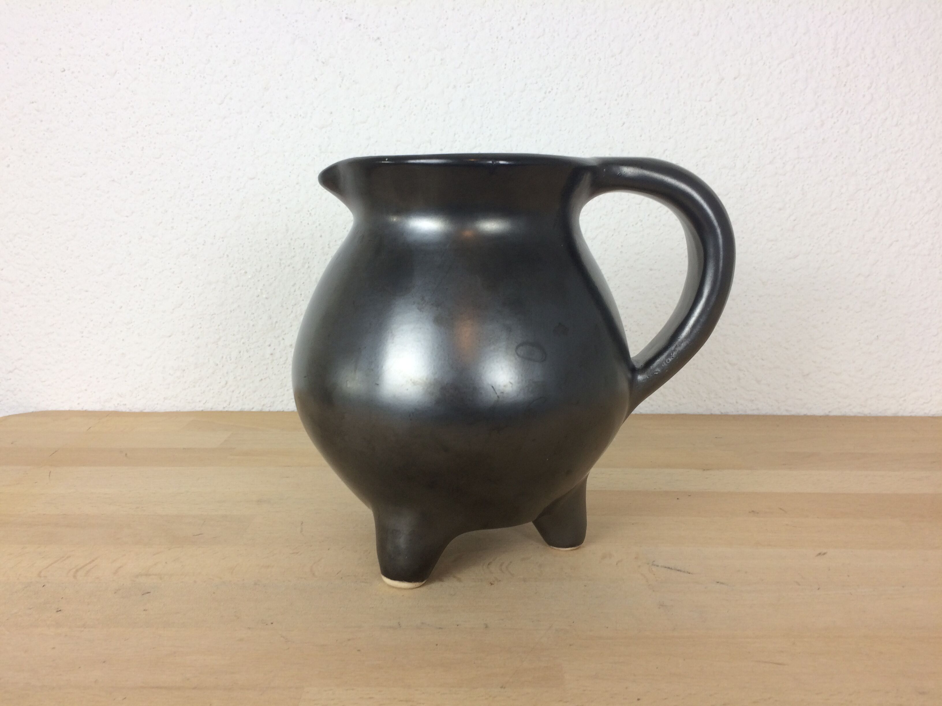Black satin ceramic tripod pitcher 50s