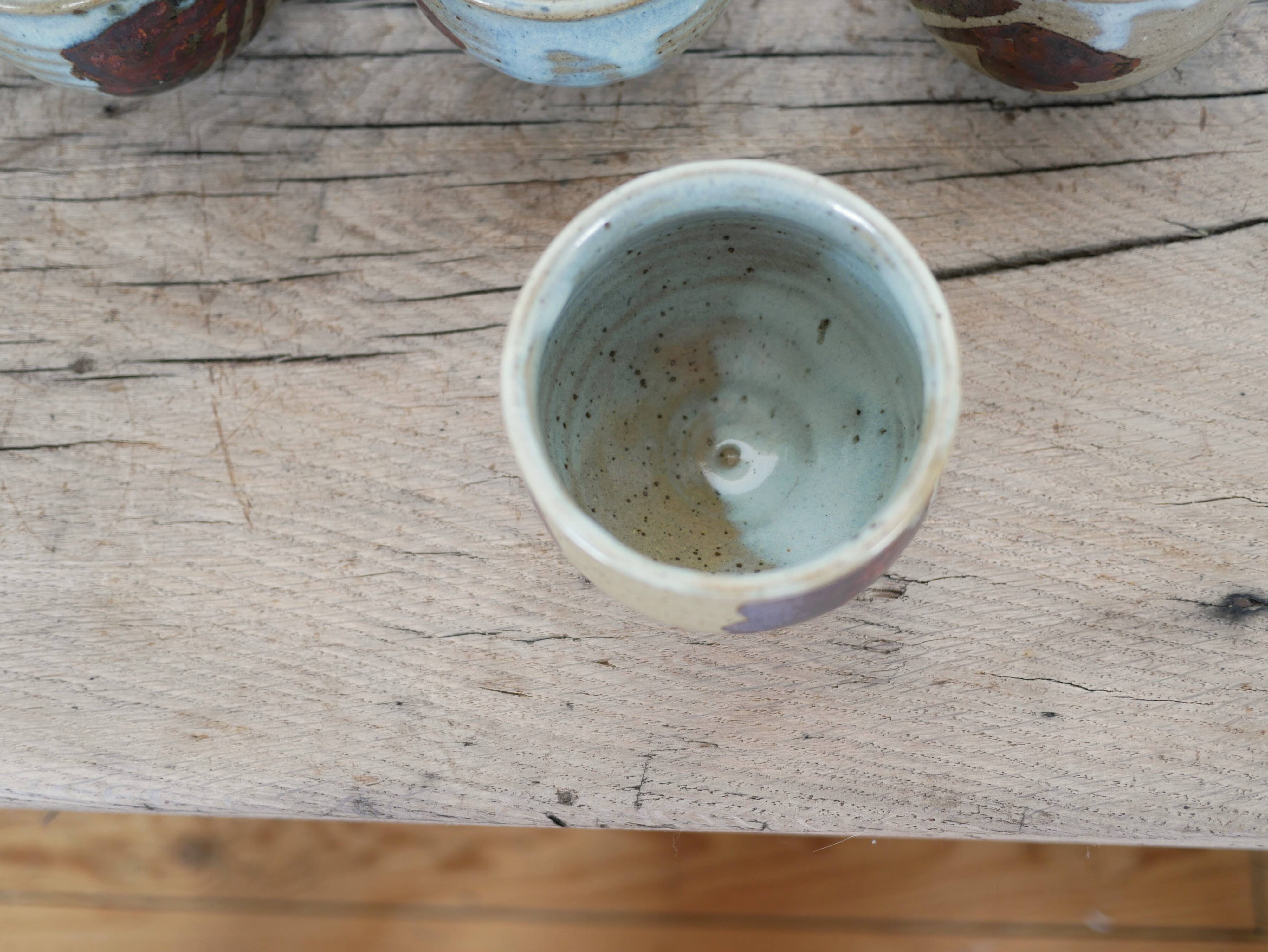 Series of 5 vintage stoneware cups