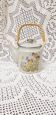 Vintage teapot with botanical patterns