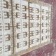 Moroccan Berber rug in cream and camel 250x200 cm – geometric patterns