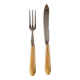 Case with cutlery for serving or cutting meat in baquelite