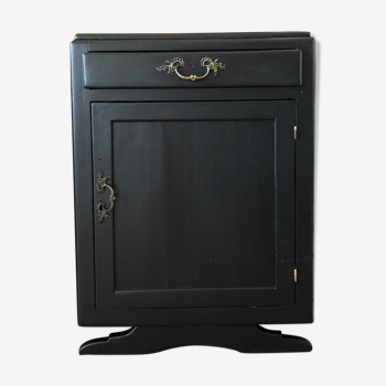 Black patinated storage cabinet