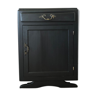 Black patinated storage cabinet
