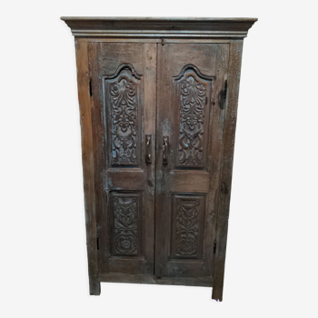 Carved teak cabinet