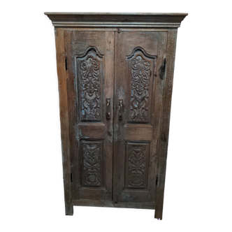 Carved teak cabinet