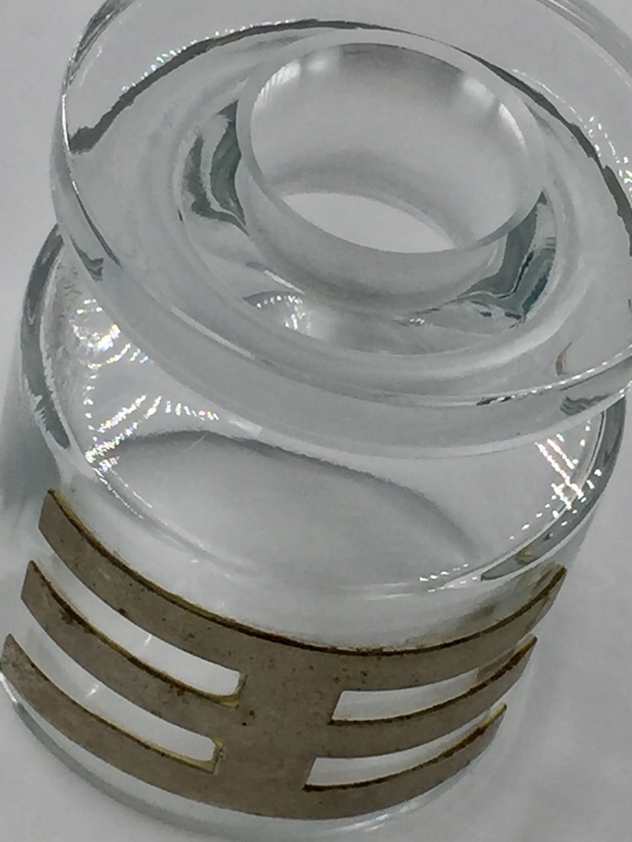 Two vintage 70s glass and metal bottles