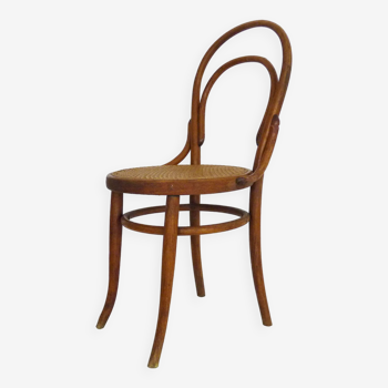 Bistro chair in wood and canework. The 50's