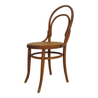 Bistro chair in wood and canework. The 50's