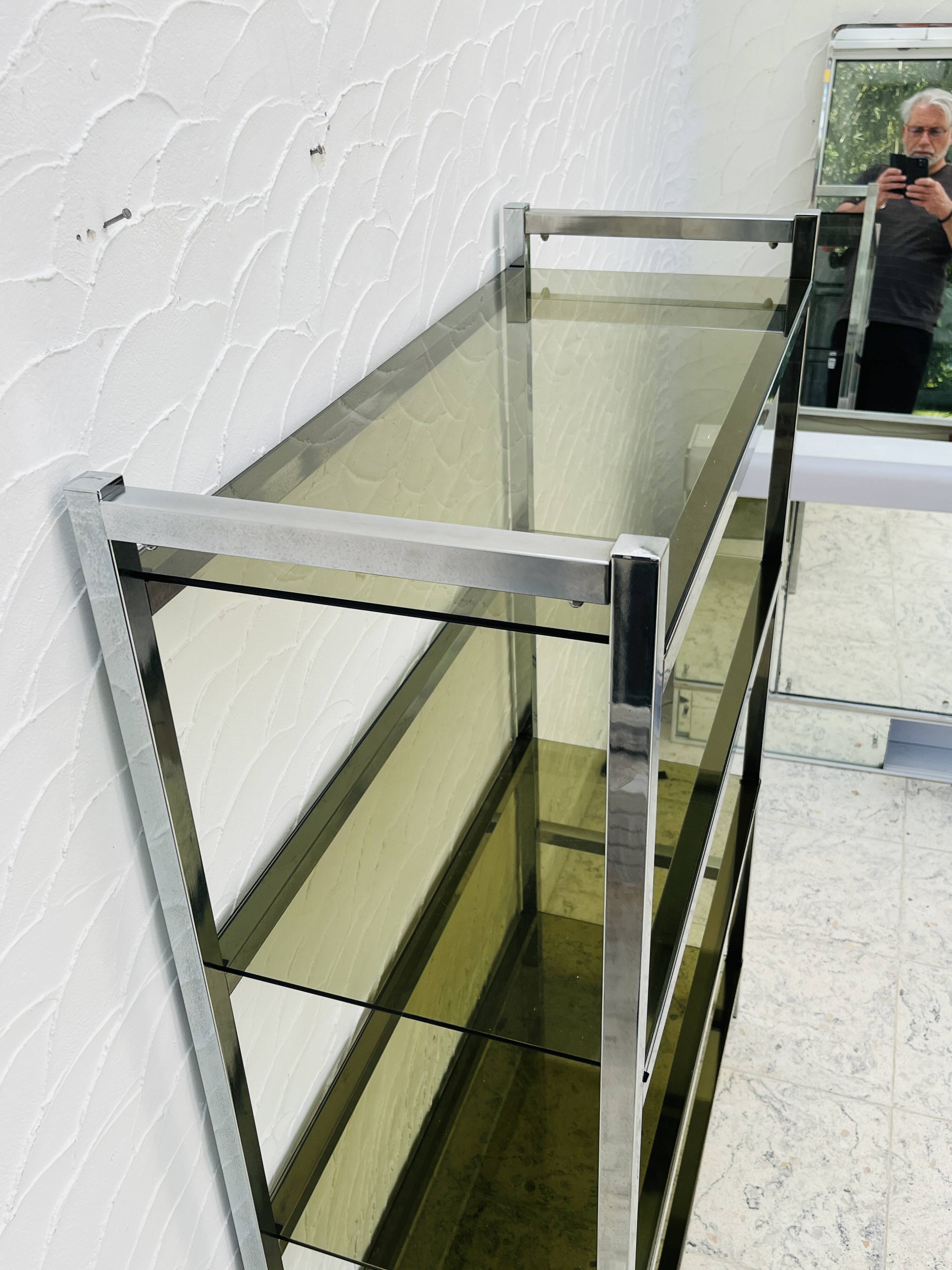 Chrome and smoked glass shelf in Italian 1970s style.