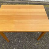 Rectangular Scandinavian dining table in wood for 8 people.