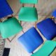 Series of velvet Scandinavian chairs - green and blue.