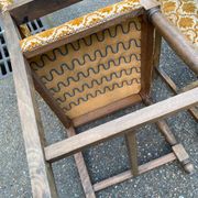2 Henri II armchairs in solid wood and yellow-beige velvet.