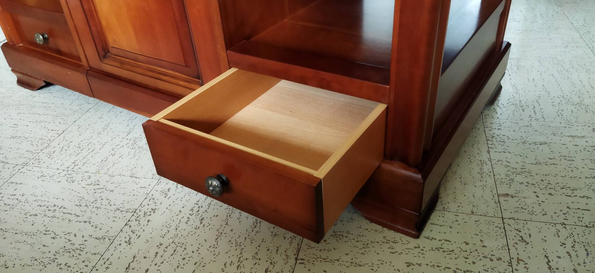 Louis Philippe style coffee table in cherry wood with large drawers.