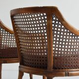Pair of armchairs in walnut and antique cane, 19th century