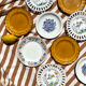 Set of twelve mismatched vintage dessert plates.