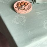Old damask tablecloth tinted in pastel green