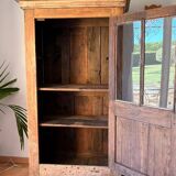 Antique bonnetière, stripped solid wood — honey patina — Provençal farmhouse style.