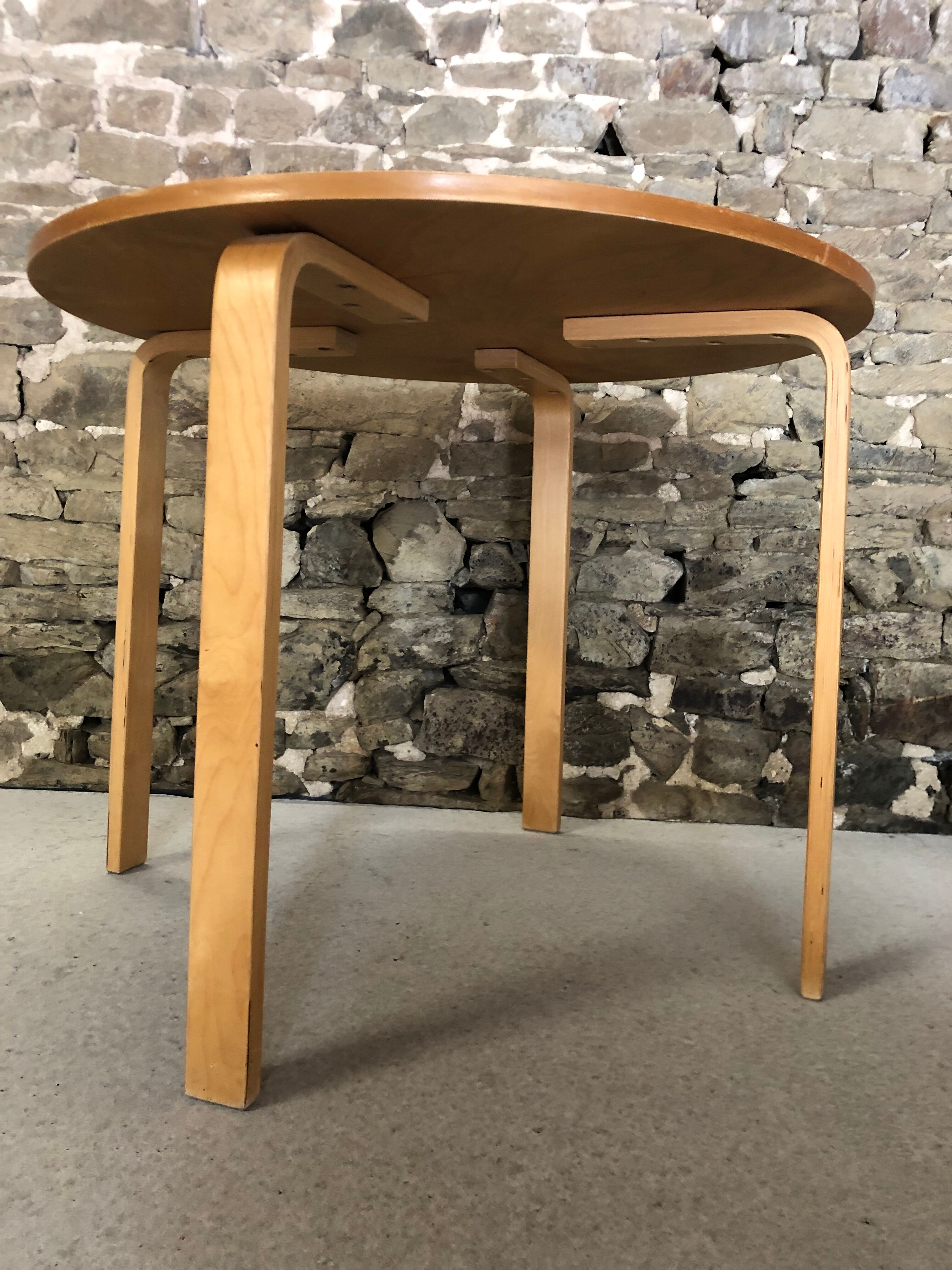 Round dining table in vintage wood