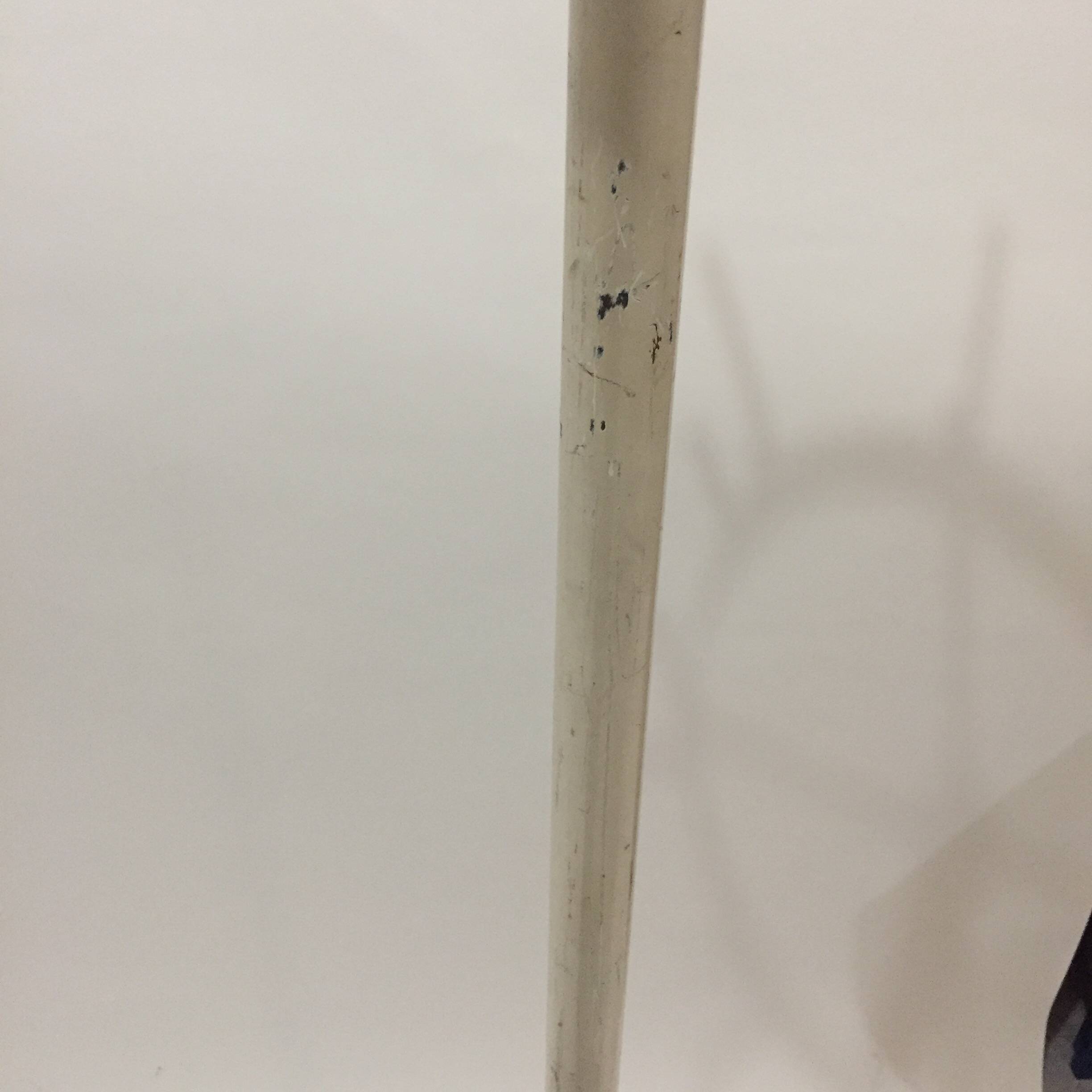 Coat rack on turnstile stand