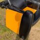 Pair of black imitation leather armchairs