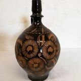 Jug in varnished sandstone