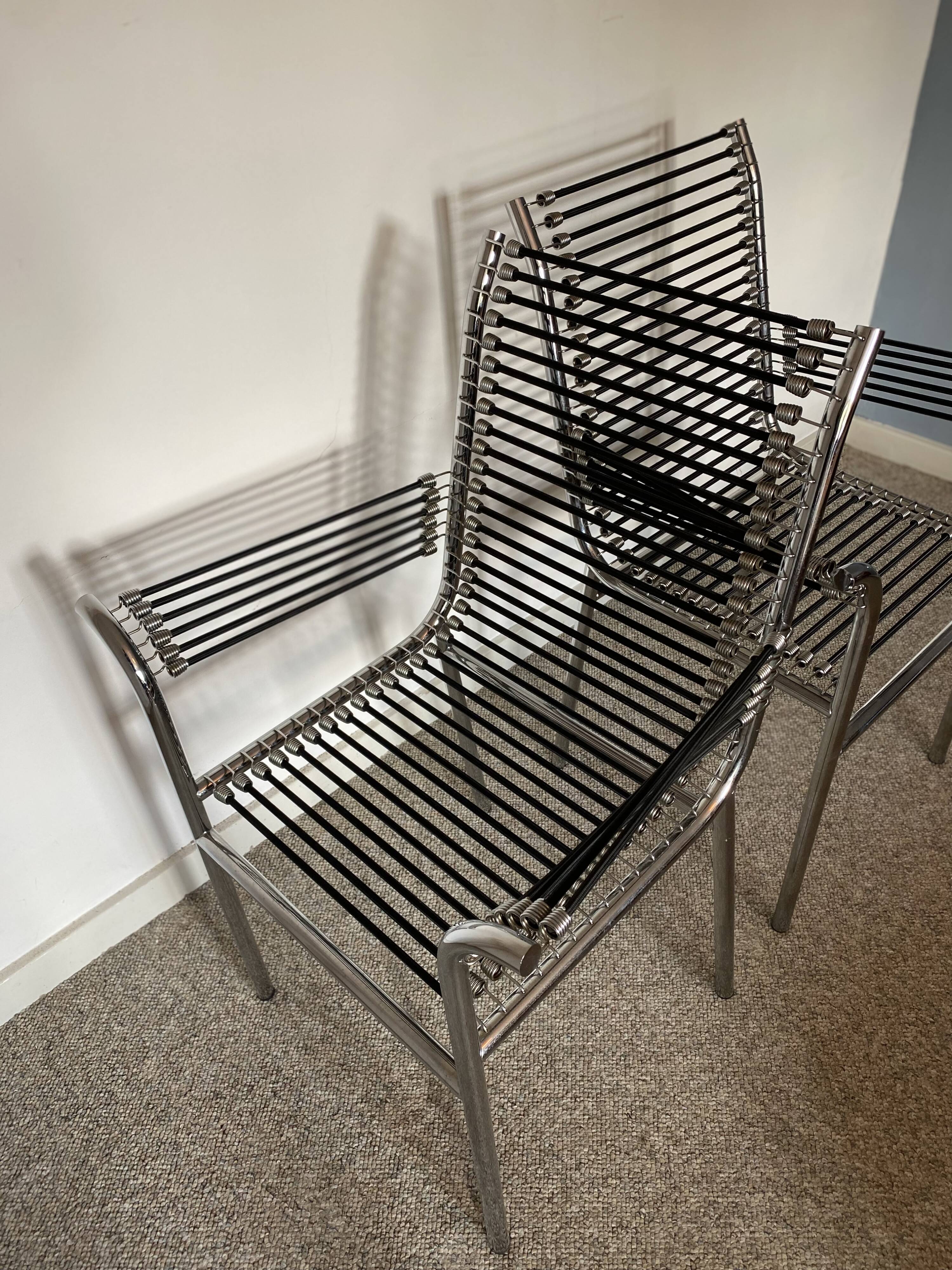 Set of 4 ‘bungee’ lounge chairs