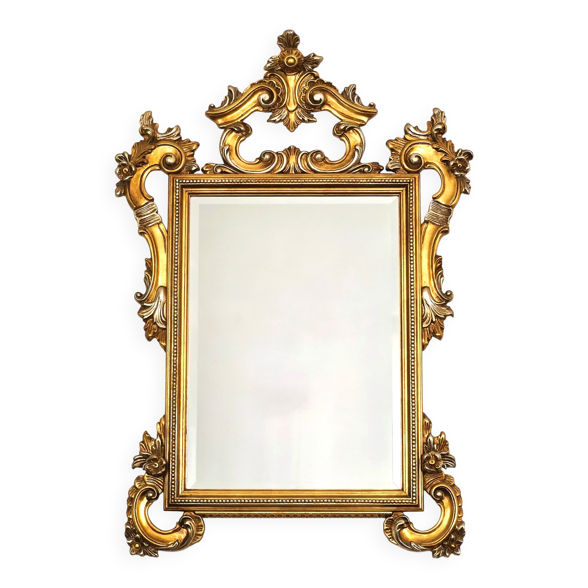 Large Italian mirror in carved wood, traditional gilding, 1980s.