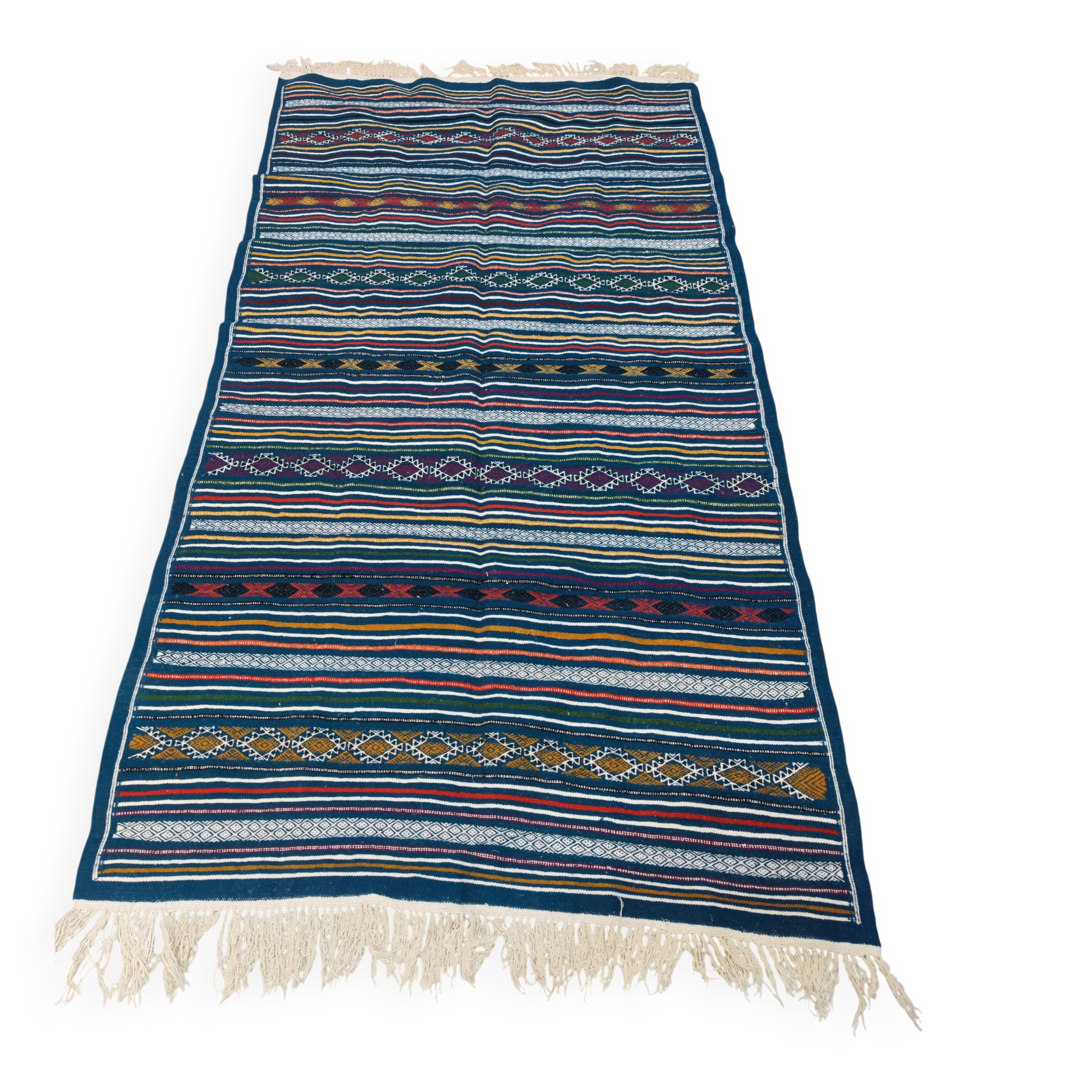 Handwoven blue kilim rug in natural wool