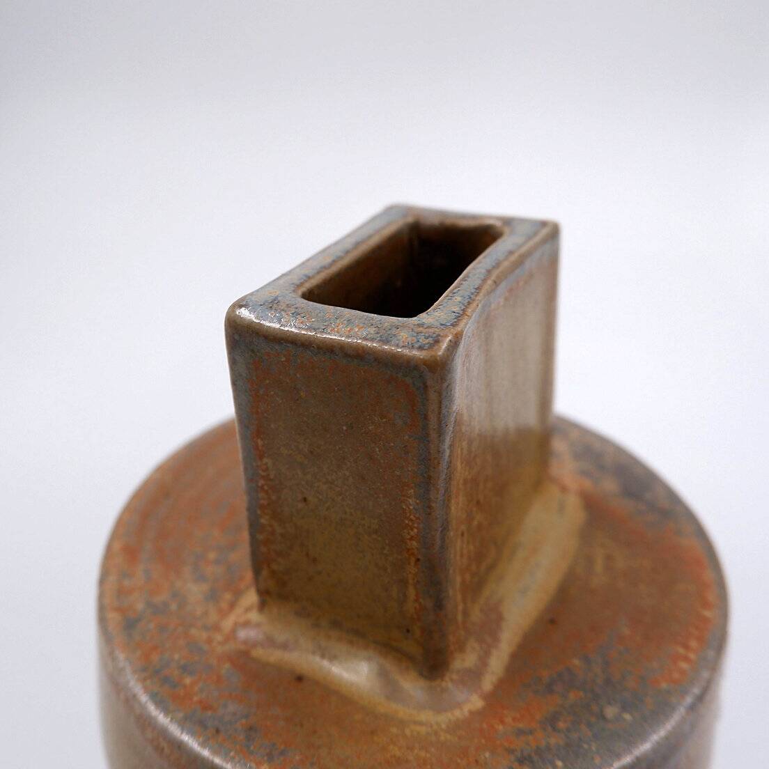 Vintage brown ceramic vase stamped "PV"