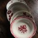 A set of 4 mismatched Art Deco red blue soup plates