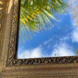 Miroir en bois et stuc doré