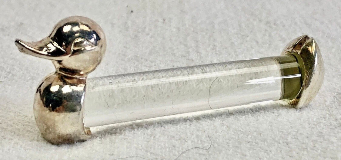 12 silver-plated metal duck knife rests with crystal.