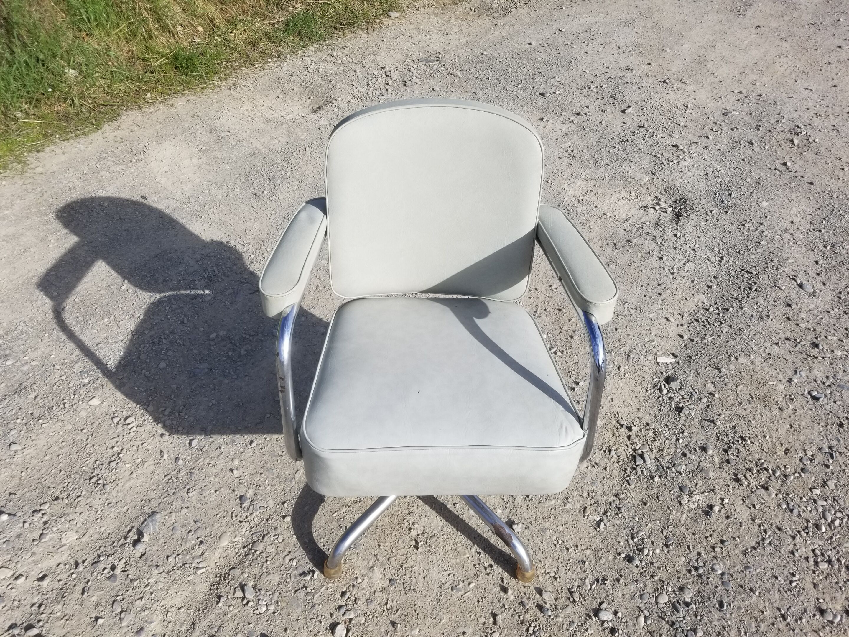 Old light grey pullman swivel office chair
