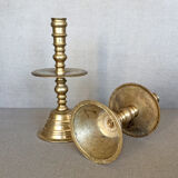Pair of bronze church candle holders