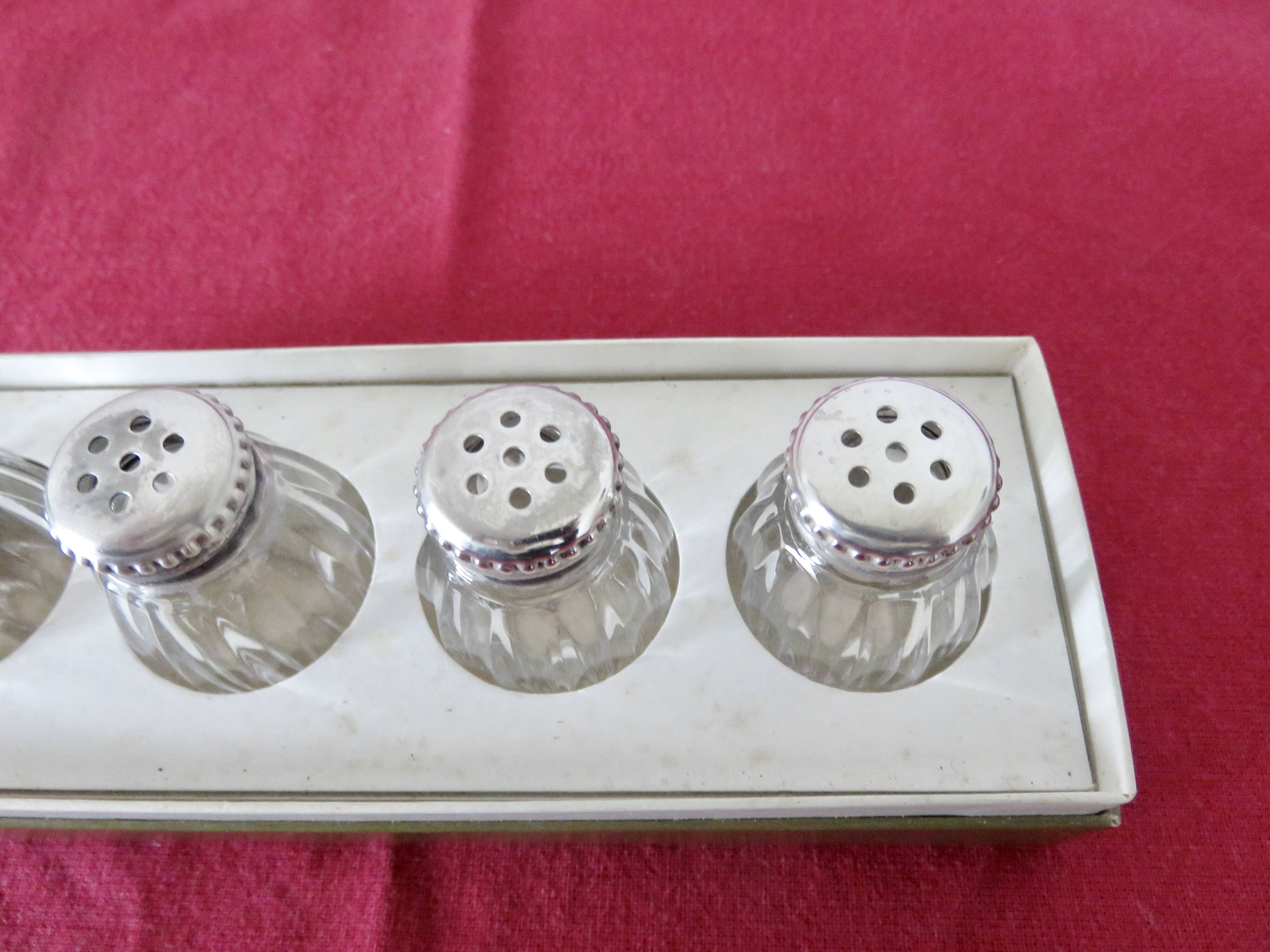 Salt and pepper "CHRISTOFLE" in solid silver in their original box, 1950.