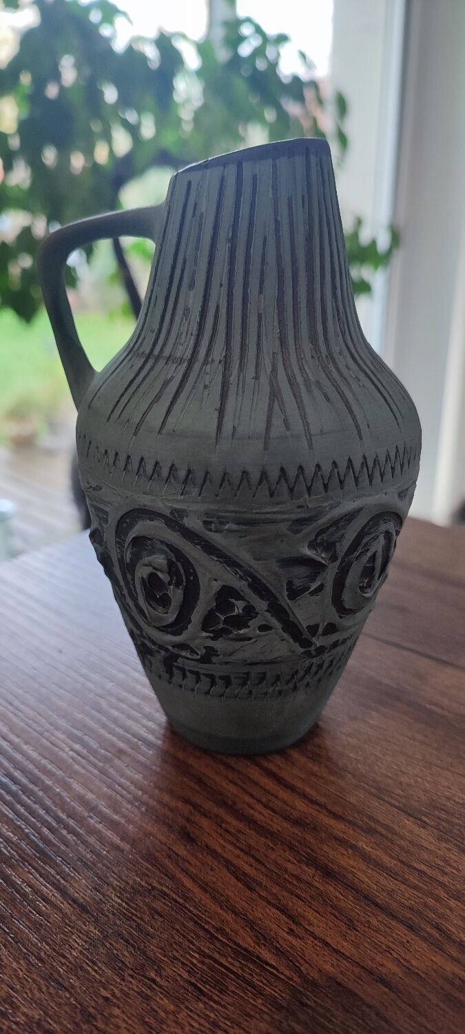Vintage terracotta pitcher vase