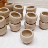 Set of 17 buckets sandstone snails