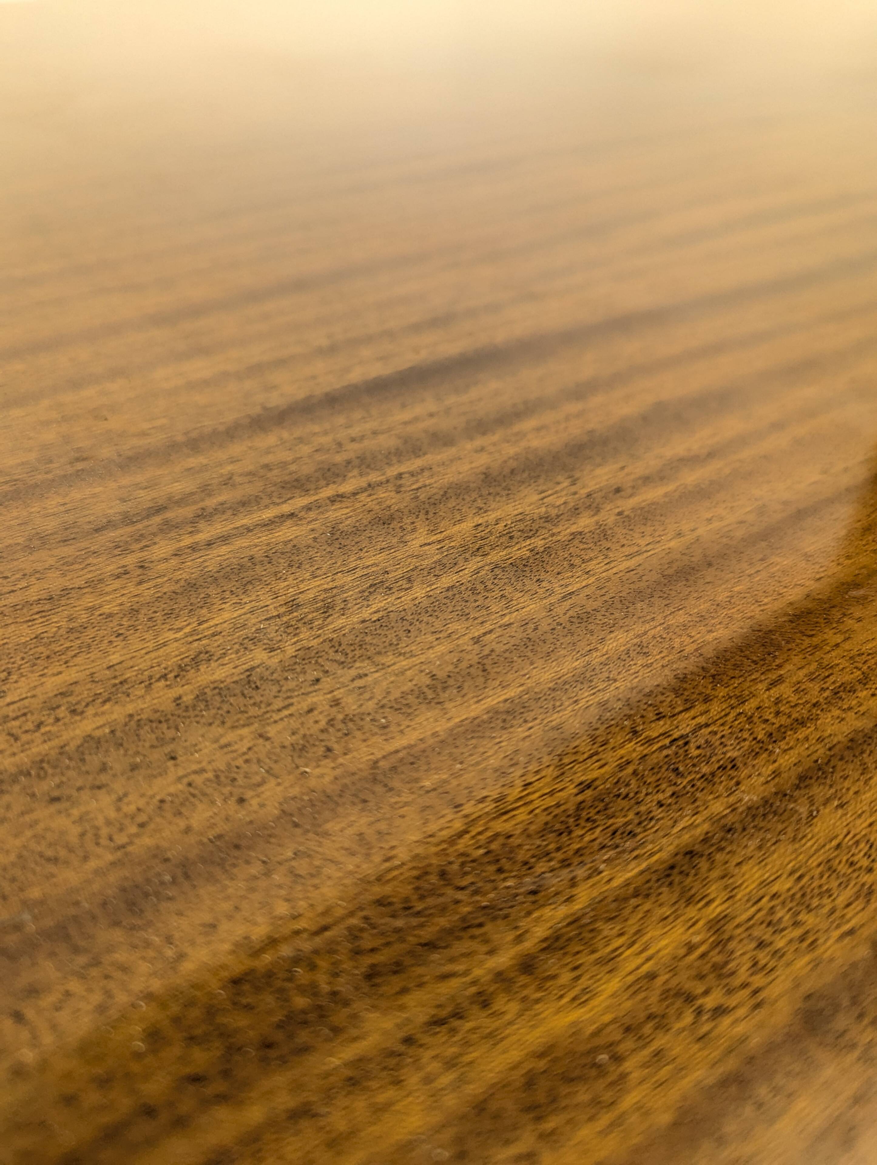 Modernist table in rosewood and brass