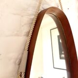 Oval hall mirror, wooden frame. Scandinavia 1960s 33x100cm